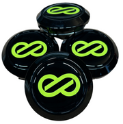 Four black wheel hub covers with green infinity symbol on a white background
